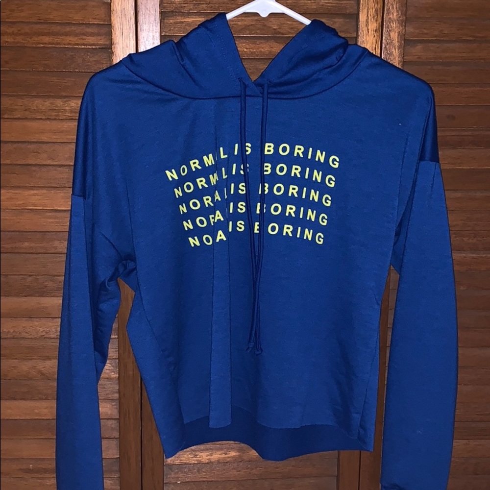 Blue lettered cropped sweatshirt.